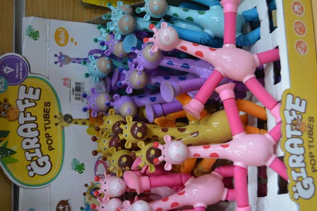 GIRAFFE POP TUBES THE HEAD OF A GIRAFFE WILL GLOW NO 777 12A